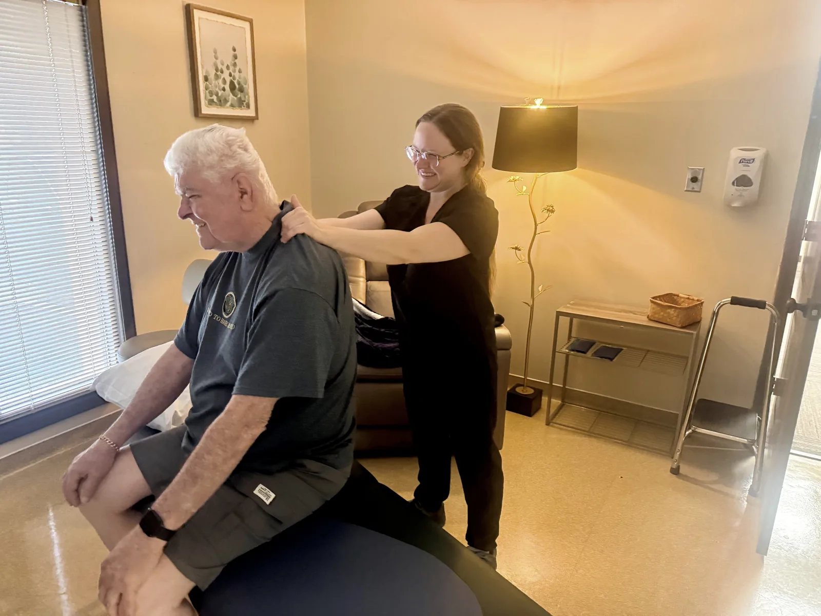 A clinician releasing a trigger point during myofascial massage